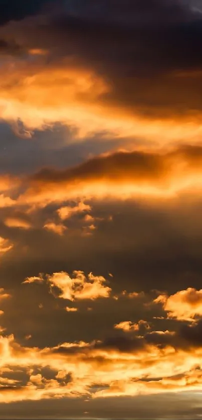 Dramatic sky with orange clouds during sunset.
