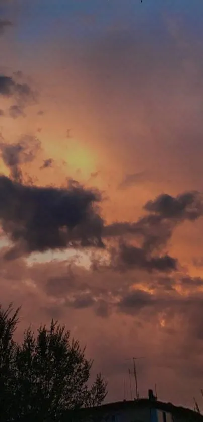 Dramatic sunset sky with clouds and vibrant colors.