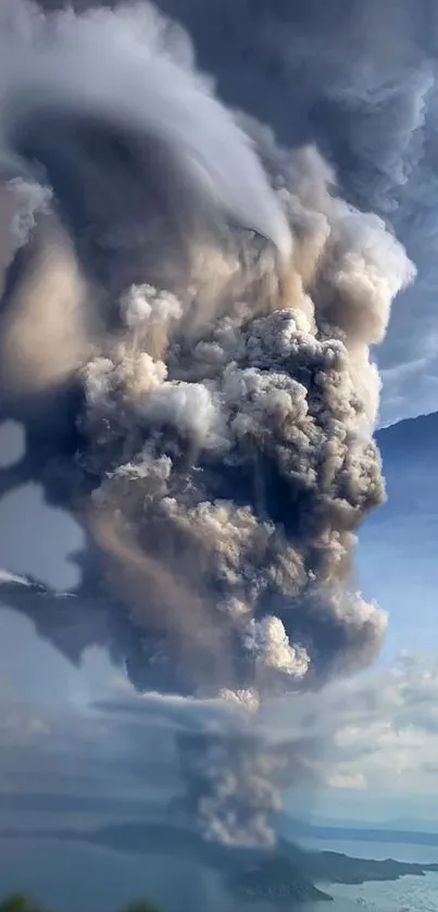 Dramatic volcanic eruption with ash plume against a blue gray sky.