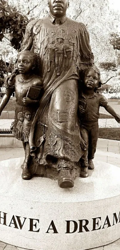 Sepia-toned memorial statue with 'I Have a Dream' inscription.