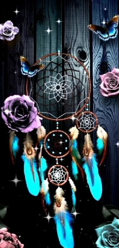 Dreamcatcher with roses and feathers over dark wood background.