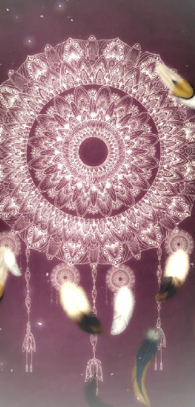 Dreamcatcher mandala with lace and feathers on maroon background.