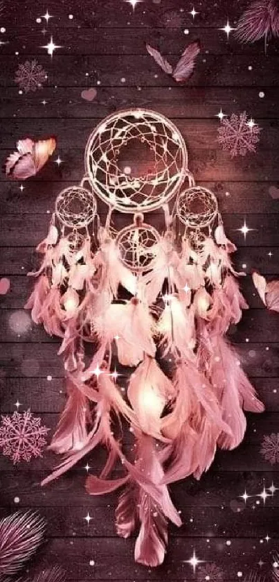 Pink dreamcatcher wallpaper with feathers and butterflies.