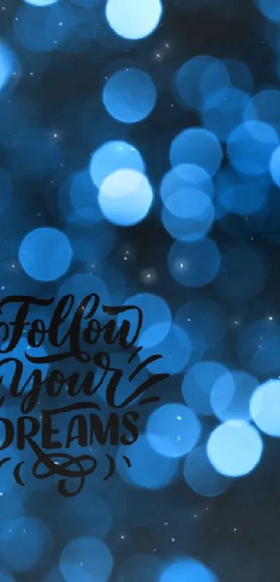 Dreamy blue bokeh wallpaper with 'Follow Your Dreams' message.