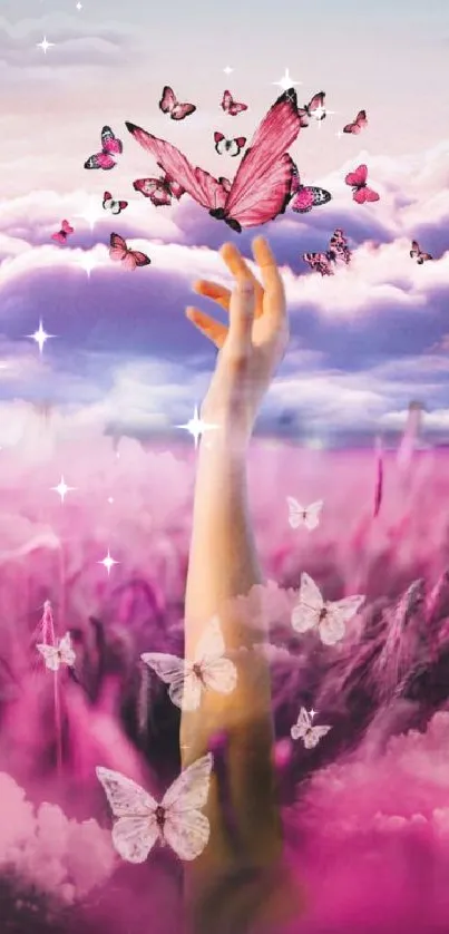 Hand reaching through ethereal pink clouds with butterflies fluttering above.