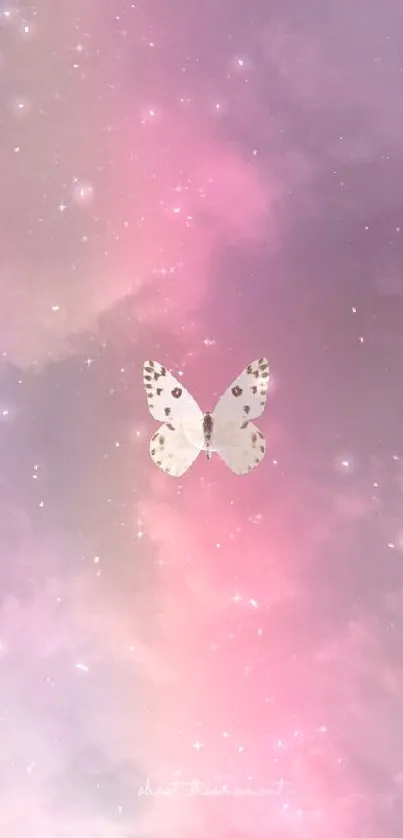 Butterfly amidst dreamy pink and purple sky wallpaper.