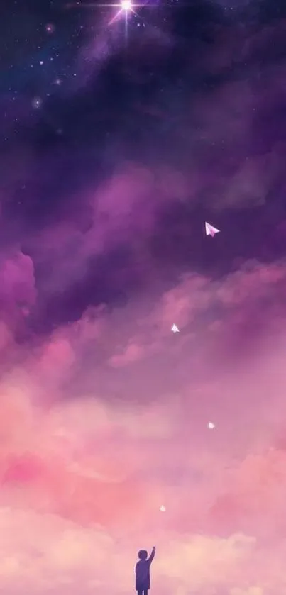 Silhouette under a dreamy purple cosmic sky with stars.