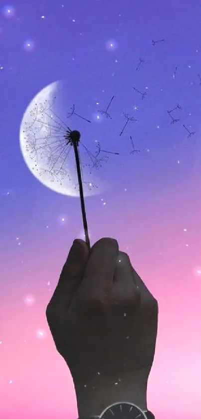 Hand holds dandelion with moon and pink-purple sky.