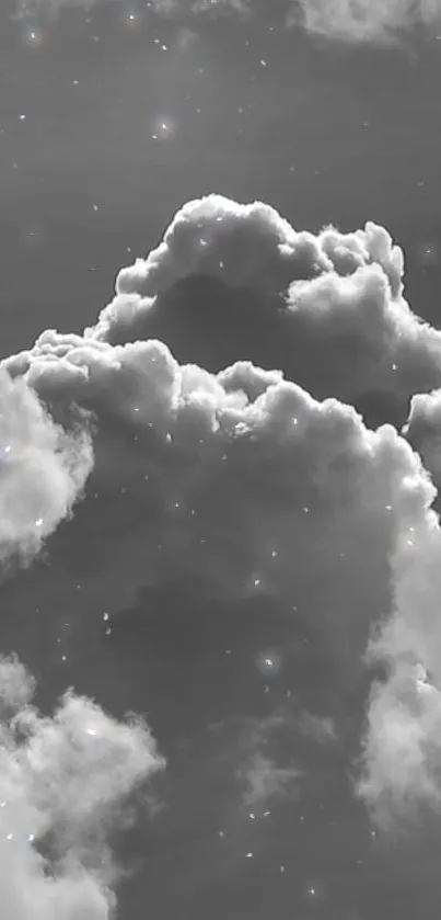 Monochrome wallpaper of clouds and stars creating a dreamy night sky effect.