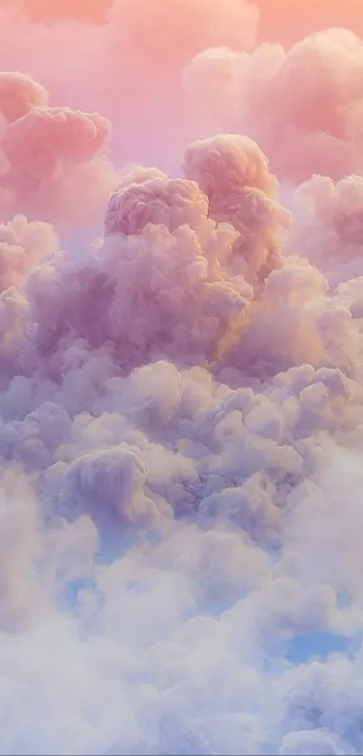 Dreamy pastel cloud wallpaper with pink and blue hues.