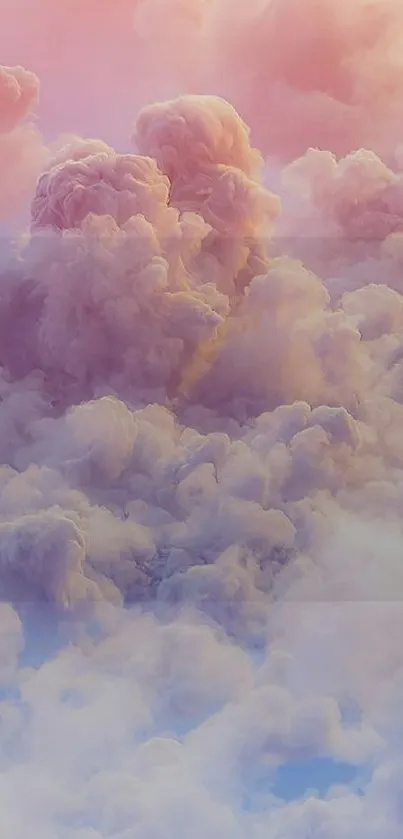 Dreamy pastel clouds with pink, purple, and blue hues create a serene wallpaper.