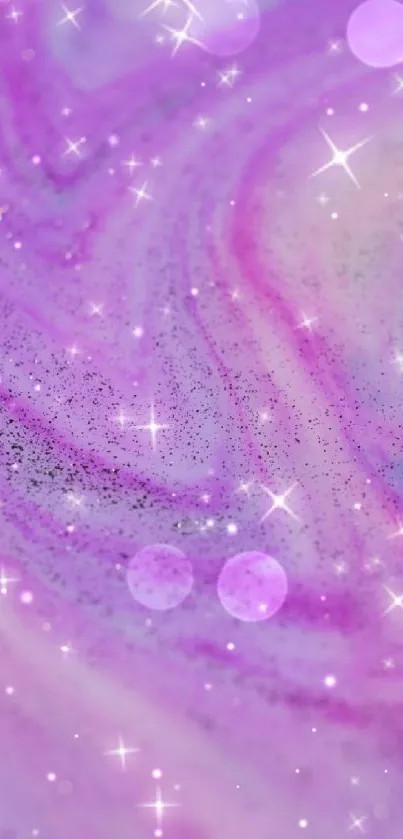 Abstract pink and purple galaxy swirl wallpaper with sparkles.