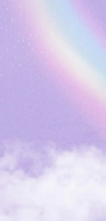 Dreamy pastel sky with rainbow and clouds wallpaper.