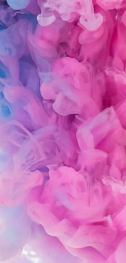 Dreamy pink and blue cloud abstract wallpaper.