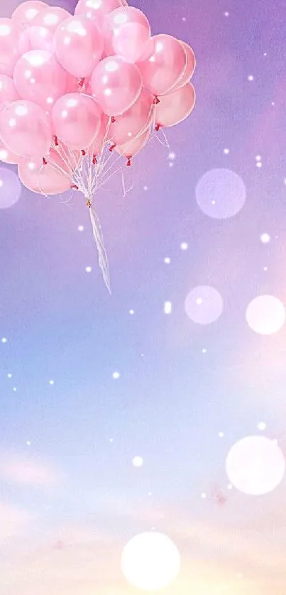 Pink balloons against a pastel sky, dreamy mobile wallpaper.