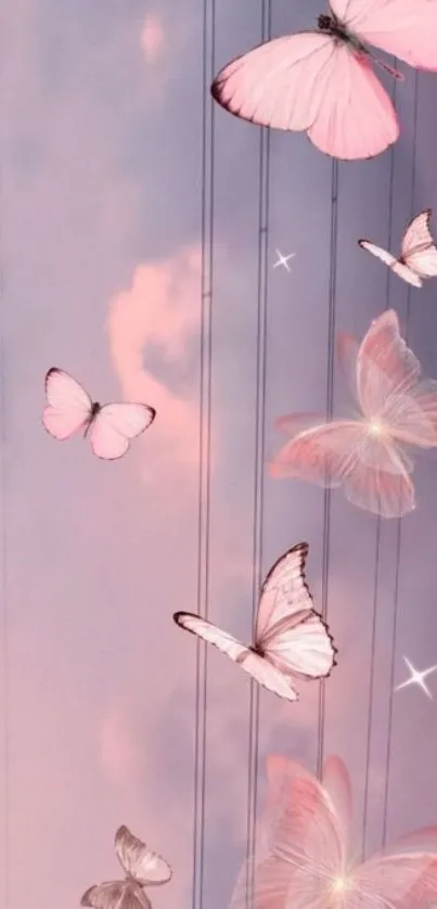 Dreamy wallpaper with pink butterflies on a pastel sky.