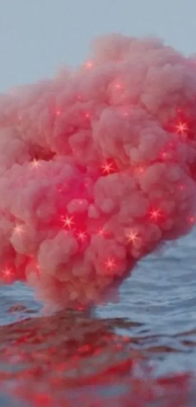 Whimsical pink cloud over ocean with glowing stars.