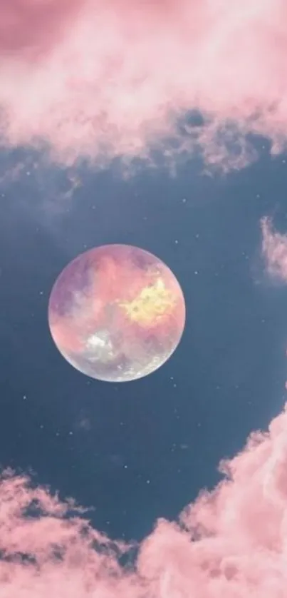 Pink moon surrounded by dreamy clouds in a night sky.