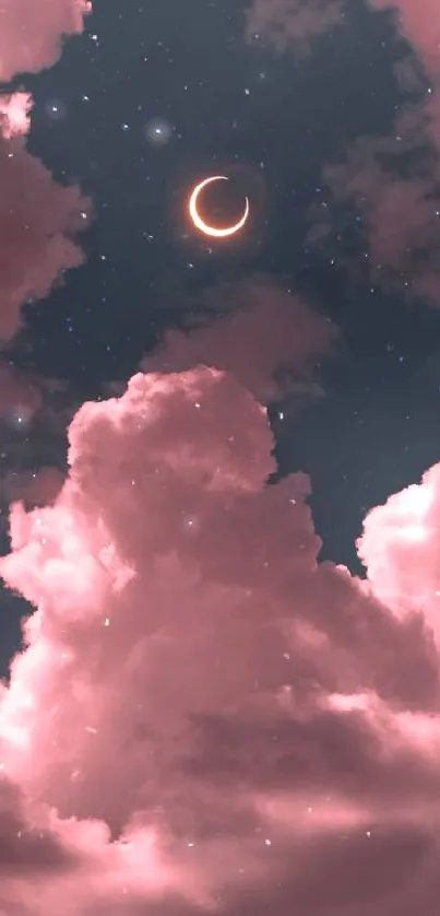 Dreamy pink clouds with a crescent moon at night.