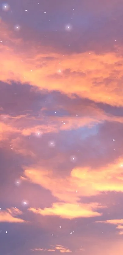 Dreamy pink sunset sky with clouds and stars.