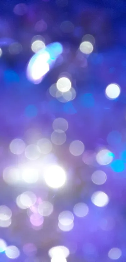 Dreamy purple bokeh wallpaper with soft light circles.