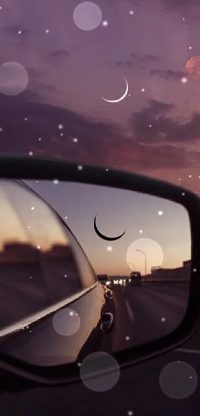 Car mirror reflecting a purple sunset with a crescent moon in a dreamy sky.