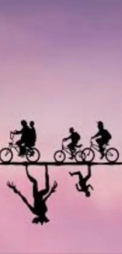 Silhouette of cyclists on pink and purple gradient background.