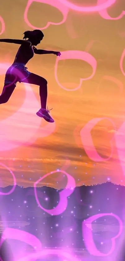 Silhouette of a jump with pink heart overlay at sunset.