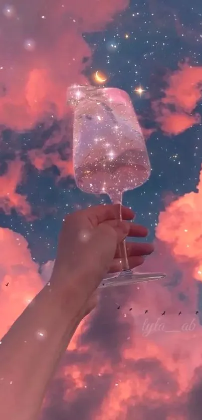 Dreamy wallpaper with pink clouds, starry sky, and a wine glass in hand.