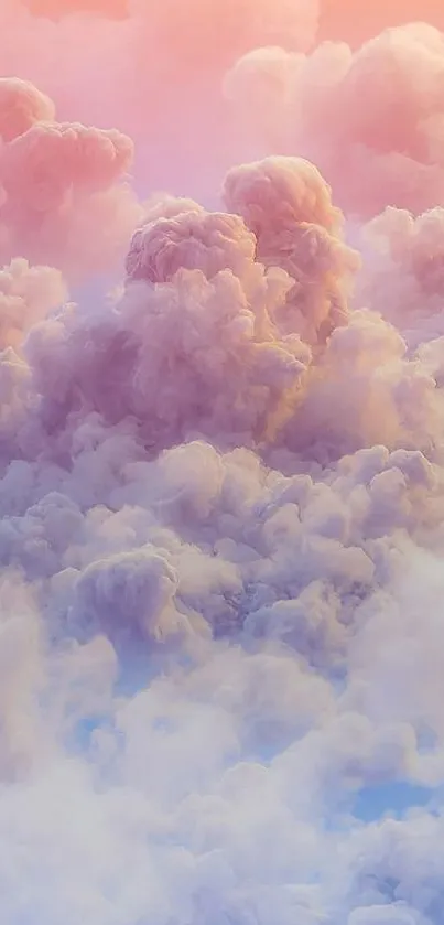 Dreamy sunset cloudscape wallpaper with pink and purple hues.