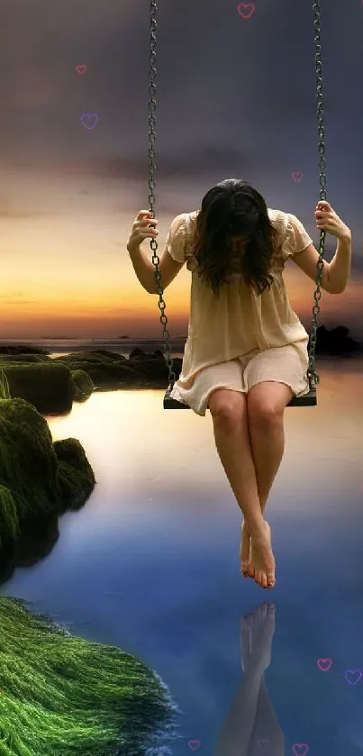 Person on swing over reflective water at dusk with mossy rocks.