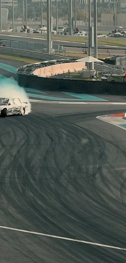 Car performing a drift on a raceway with tire smoke and sharp turns.