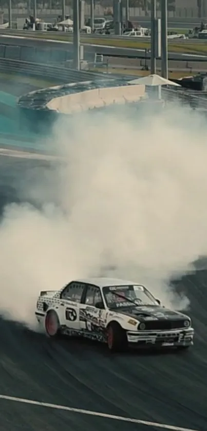 Sports car drifting on track with smoke, capturing intense racing action.