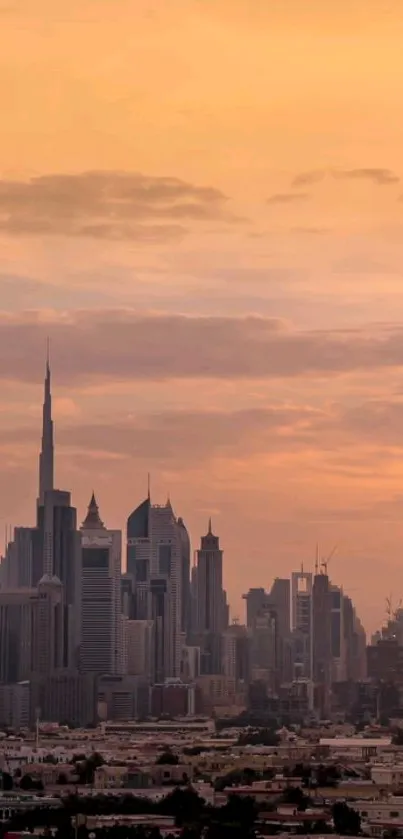 Dubai skyline silhouetted against an amber sunset.