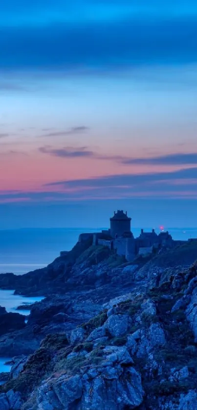 Dusk coastline with rocky cliffs and vibrant sunset sky.