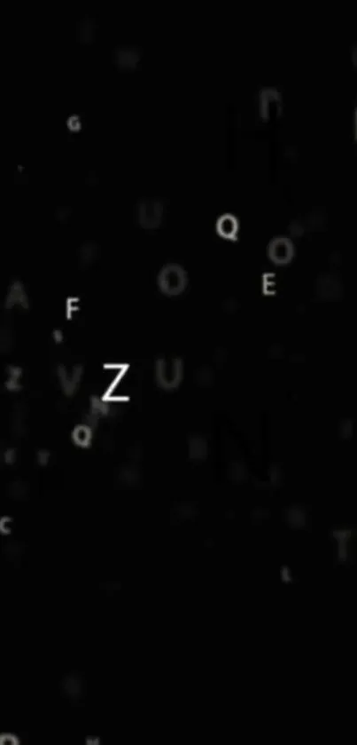 Floating alphabet letters on a black background wallpaper.