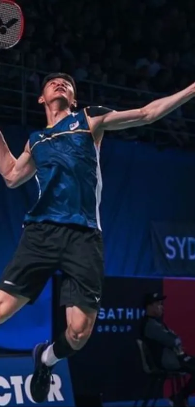 Badminton player jumping with racket mid-air.