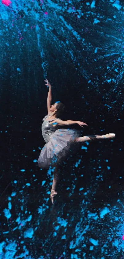 Elegant ballerina amidst blue and pink abstract splashes in motion.