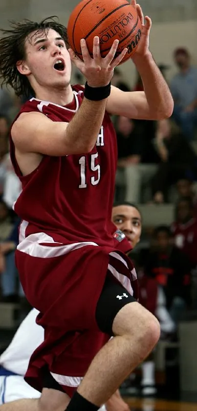 Basketball player mid-air in dynamic action shot.