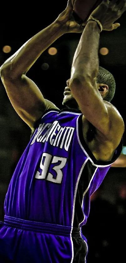 Basketball player in action with a purple jersey on the court.