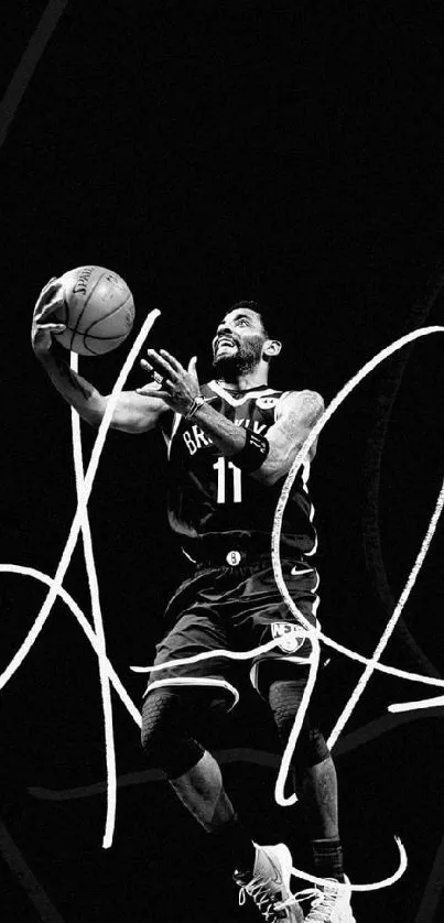 Black and white image of a basketball player performing a slam dunk.