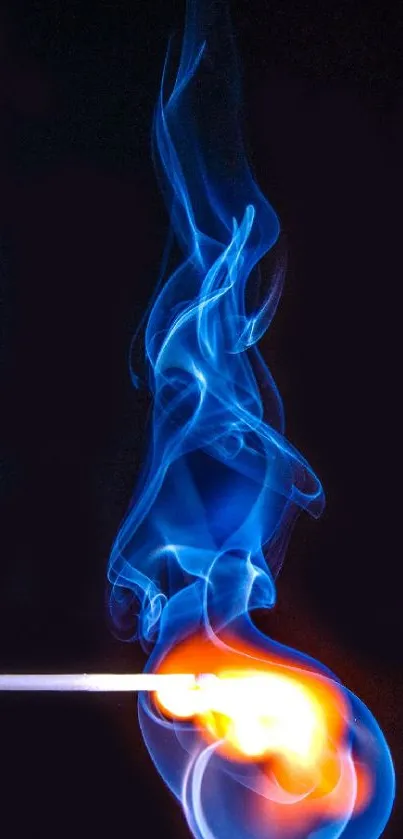 A vibrant blue flame with swirling smoke artfully captured.