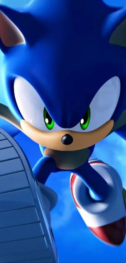 High-energy blue hedgehog in action pose wallpaper.