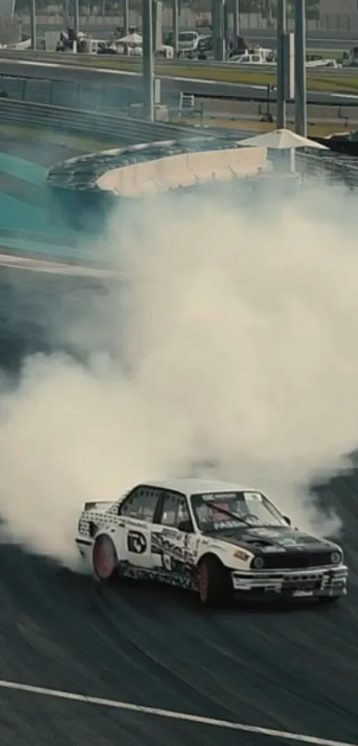 Car drifting on track with smoke clouds, capturing high-speed action.