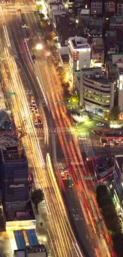 Aerial view of bustling city lights at night.