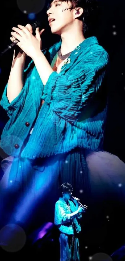 Vibrant concert performer on stage with dynamic teal lighting.