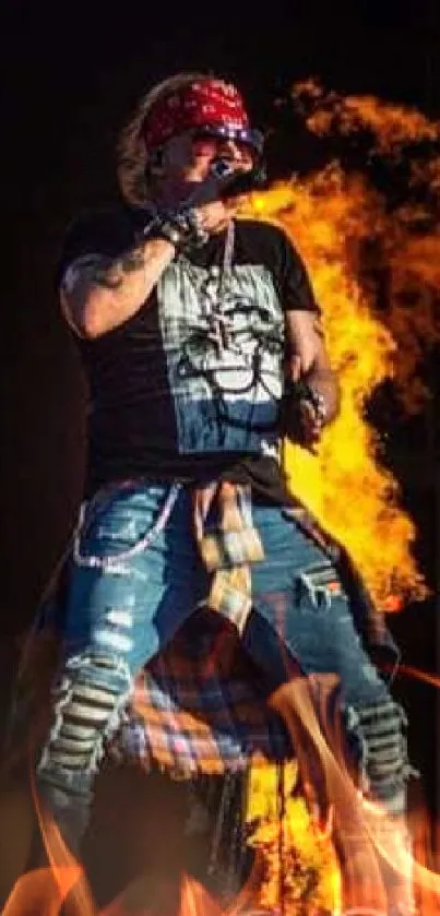 Rock performer on a fiery stage with vibrant effects.