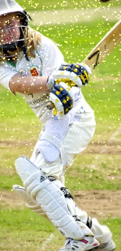 Cricketer in full swing on green field wallpaper.