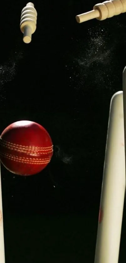 Cricket ball hits stumps with bails flying.