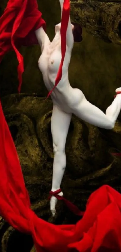 Elegant dancer with red fabric in artistic pose.